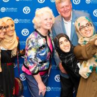 Tom and Marcia selfie with attendees